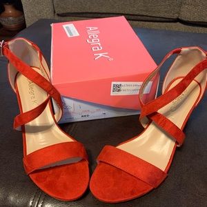 Woman’s red suede heels